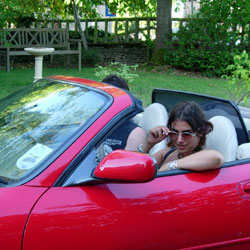 Rhiannon in a Jaguar (car)